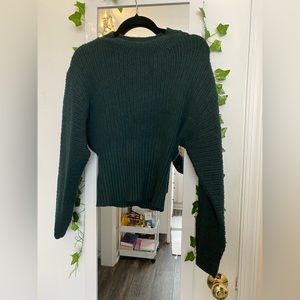 dark green sweater